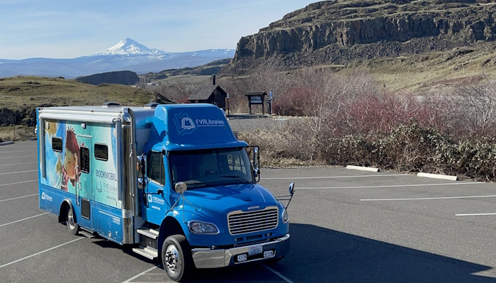 The bookmobile in the foreground of Mt. Hood and local plateaus