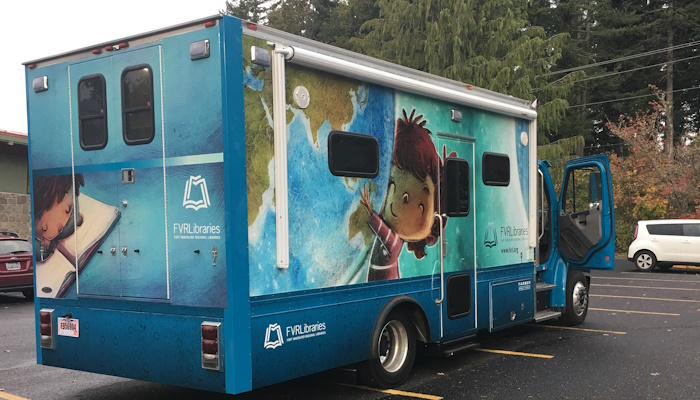 Skamania County Bookmobile pictures from rear, with view of passenger side, door ajar