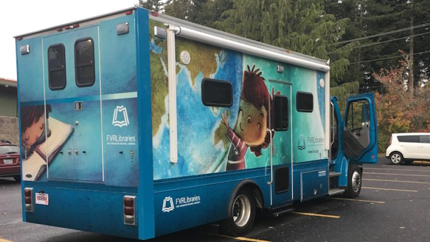 Skamania County Bookmobile pictures from rear, with view of passenger side, door ajar